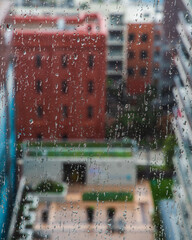 City through rainy window