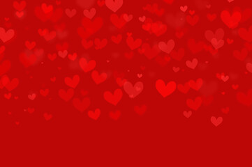 Many red hearts of different sizes falling on a red background, abstraction