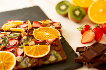 Dried fruits chocolate bark and fresh fruits