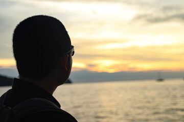Fototapeta premium silhouette of a man in sunset