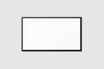 realistic blank frames mockup hanging on wall