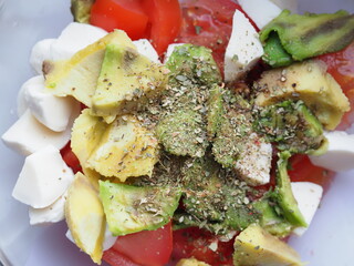 potato slices baked in butter with oregano turmeric and curry