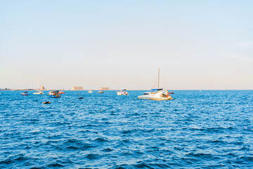 Boats and waves in the sea, hot Crimean summer