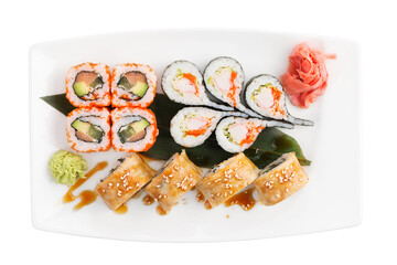 Japan sushi rolls isolated on white background. Conception of original restaurant presentation.