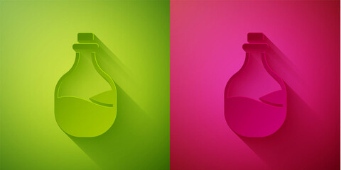 Paper cut Old bottle of wine icon isolated on green and pink background. Paper art style. Vector.