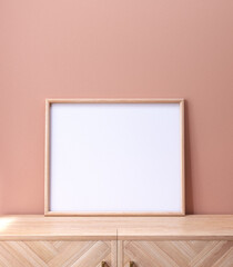  wood frame photo mockup on sideboard  of a pastel color room 
