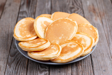 Homemade pancakes on a plate on a table