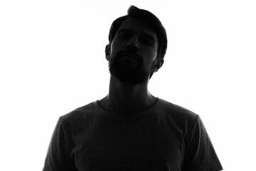 portrait of a man dark silhouette on a light background cropped view Copy Space