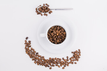coffee cup with coffee beans on white background