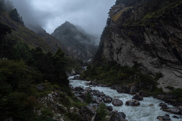 Fototapeta na wymiar River in Mountain hills, early morning, Nepal area, way to Mount Everest