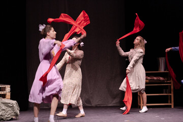 actress girls plays a retro lyrical performance of the show on the stage of the theater