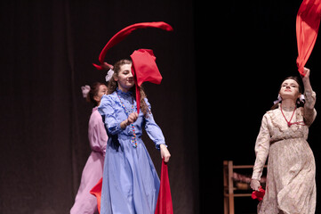 actress girls plays a retro lyrical performance of the show on the stage of the theater