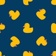 Cute pattern with yellow ducks on a blue background