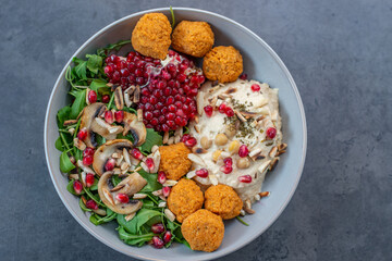 healthy home made avocado hummus salad bowl