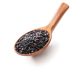 Black rice in a wooden spoon isolated on white background