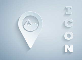 Paper cut Map pointer with mountain icon isolated on grey background. Mountains travel icon. Paper art style. Vector.