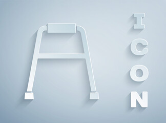 Paper cut Walker for disabled person icon isolated on grey background. Paper art style. Vector.
