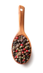 Mix of difefrent pepper black white pink green and allspice in a wooden spoon isolated on white...