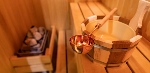 Finnish wooden Sauna small private room with traditional accessories