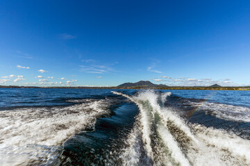 Fototapeta na wymiar Trace tail of speed boat in Lake Taupo, New Zealand