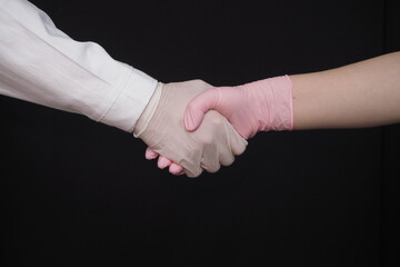 Personal protective equipment. Medical gloves. Two hands in medical gloves