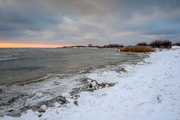 Frozen and snowy beach in Jastarnia on the Hel Peninsula. Poland
