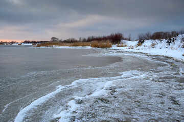 Frozen and snowy beach in Jastarnia on the Hel Peninsula. Poland