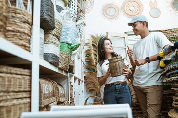 A couple chatting when selecting crafts between craft items in the craft gallery