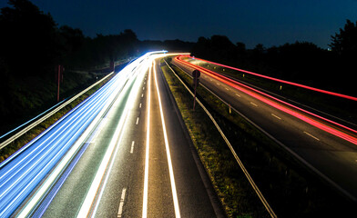 Traffic at night, used to paint a long exposure photo. Taken from a bridge in Randers, Danmark.