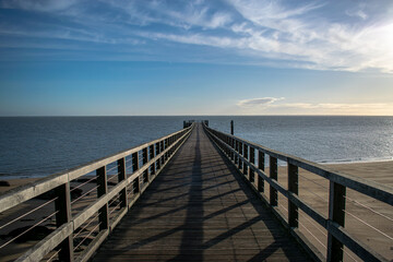 Fototapeta premium Vendée, France; January 15, 2021: The Noirmoutier island pier on a clear day.