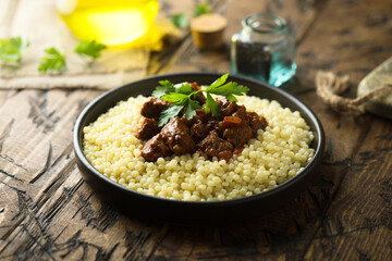 Ptitim with spicy beef ragout