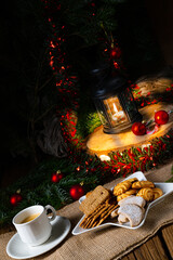Different types of biscuits with rustic Christmas decorations