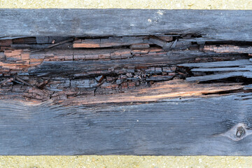 old dilapidated wooden sleeper
