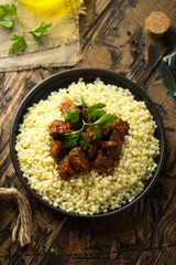 Ptitim with spicy beef ragout