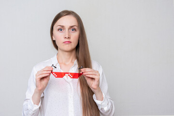 Confused woman with pixel glasses, portrait, white background, ccopy space