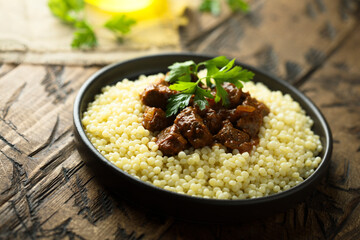 Ptitim with spicy beef ragout