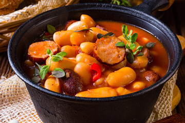 Delicious bean stew with sausage and potato