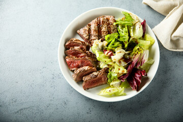 Mixed salad with grilled beef steak