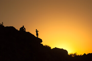 group of boys capture the sunset