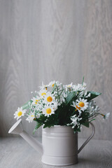 bouquet of white daisies in a vase