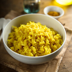 Homemade spicy rice in a white bowl