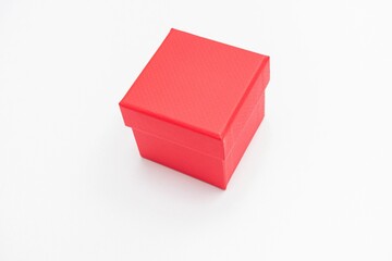Red cardboard box, white background, copy space