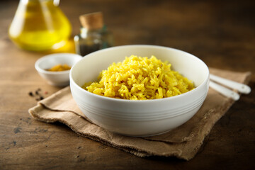 Homemade spicy rice in a white bowl