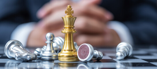 gold Chess King figure stand out from crowd of enermy or opponent during chessboard competition. Strategy, Success, management, business planning, interruption, win and leadership concept © Jo Panuwat D