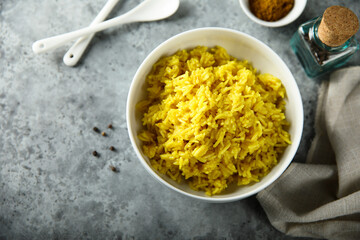 Homemade spicy rice in a white bowl