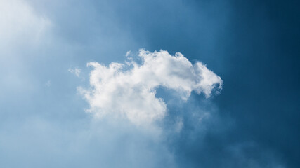Lonely cloud above celestial sky