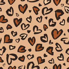Valentine Leopard or cheetah seamless pattern. Trendy animal print. Spotted hearts imitate jaguar skin. Vector background for fabric, textile, wallpaper, wrapping paper, etc