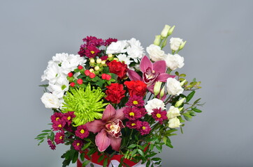 fresh flowers in paper boxes