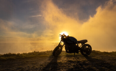 Motorbike in the sunset, Azores, Sao Miguel island, silhouette.