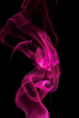swirling movement of pink smoke group, abstract line Isolated on black background